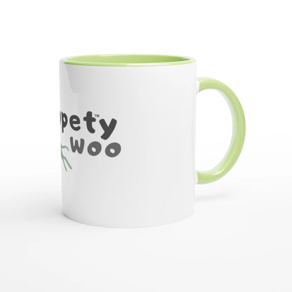 Right side view whippety woo white mug with green handle