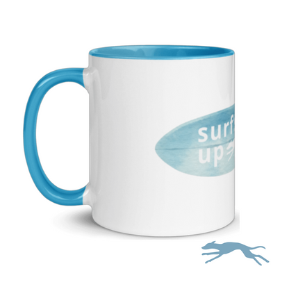 White mug with blue handle and interior, featuring a surfboard design and 'whippety surfs up' text on a white background.