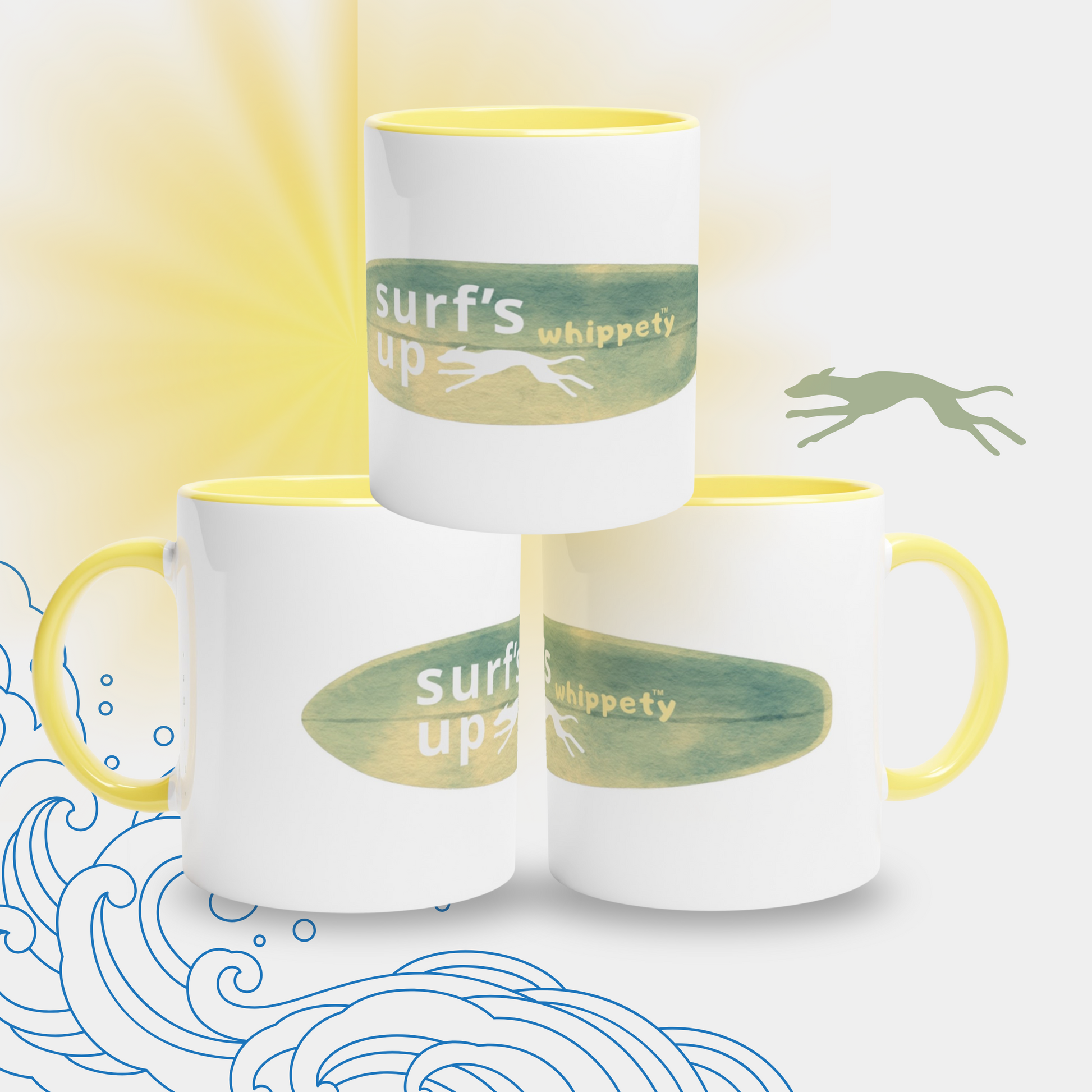 Three white mugs with yellow handles and 'surf's up whippety' text on a beach illustrated background.