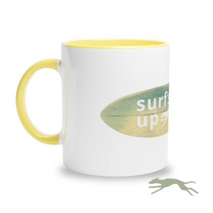 White mug with yellow interior and handle, featuring a green logo and text on a white background.